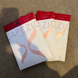 2 pairs of unopened pink tights